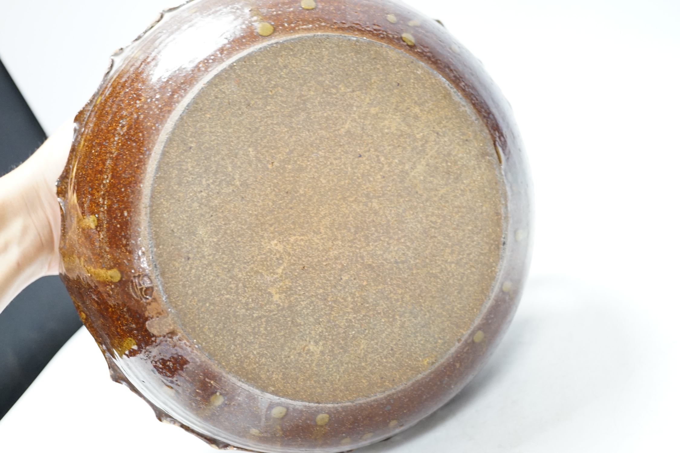 A Wenford Bridge stoneware jar and cover, Gwari, by Michael Cardew, 18cm. Condition - fair, some wear to glaze.